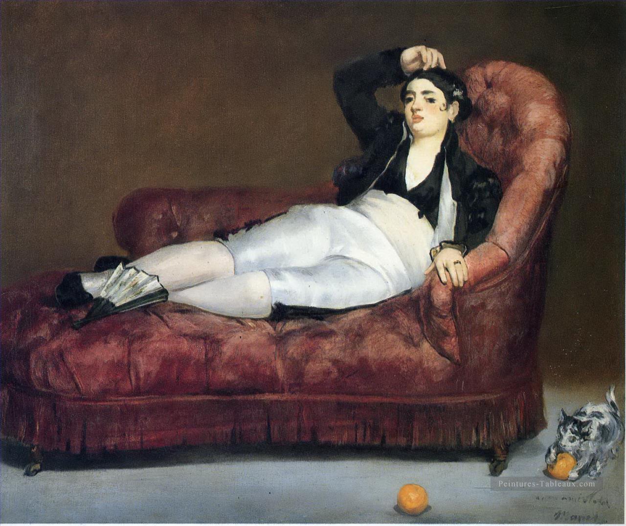 Jeune femme allongée en costume espagnol Édouard Manet Peintures à l'huile